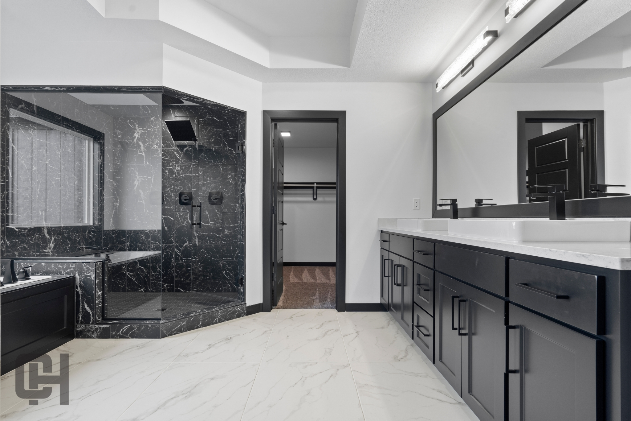 Justina Bathroom With Dual Sinks And Framed Mirrors
