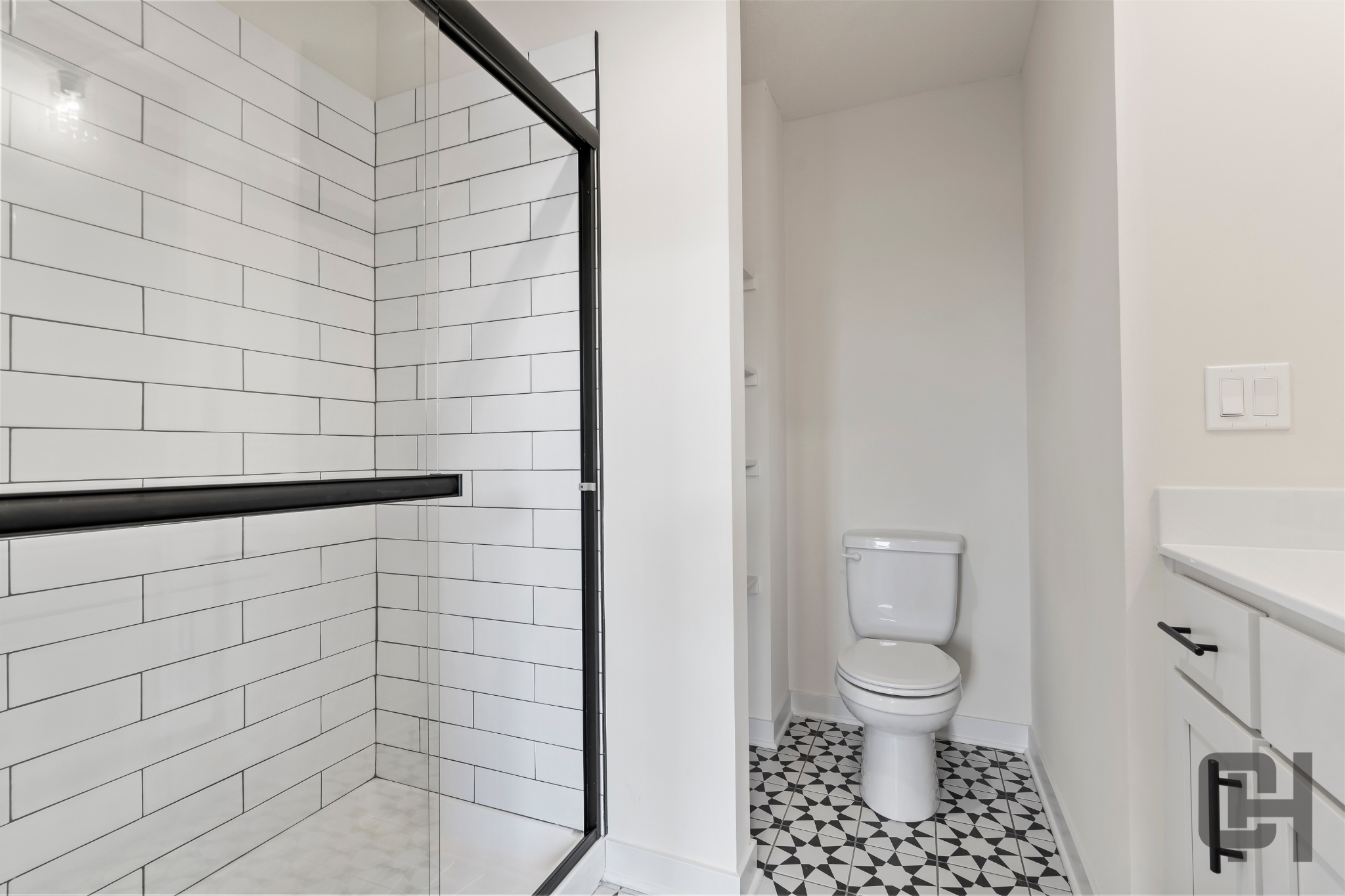 Justina Bathroom With Glass Shower Enclosure