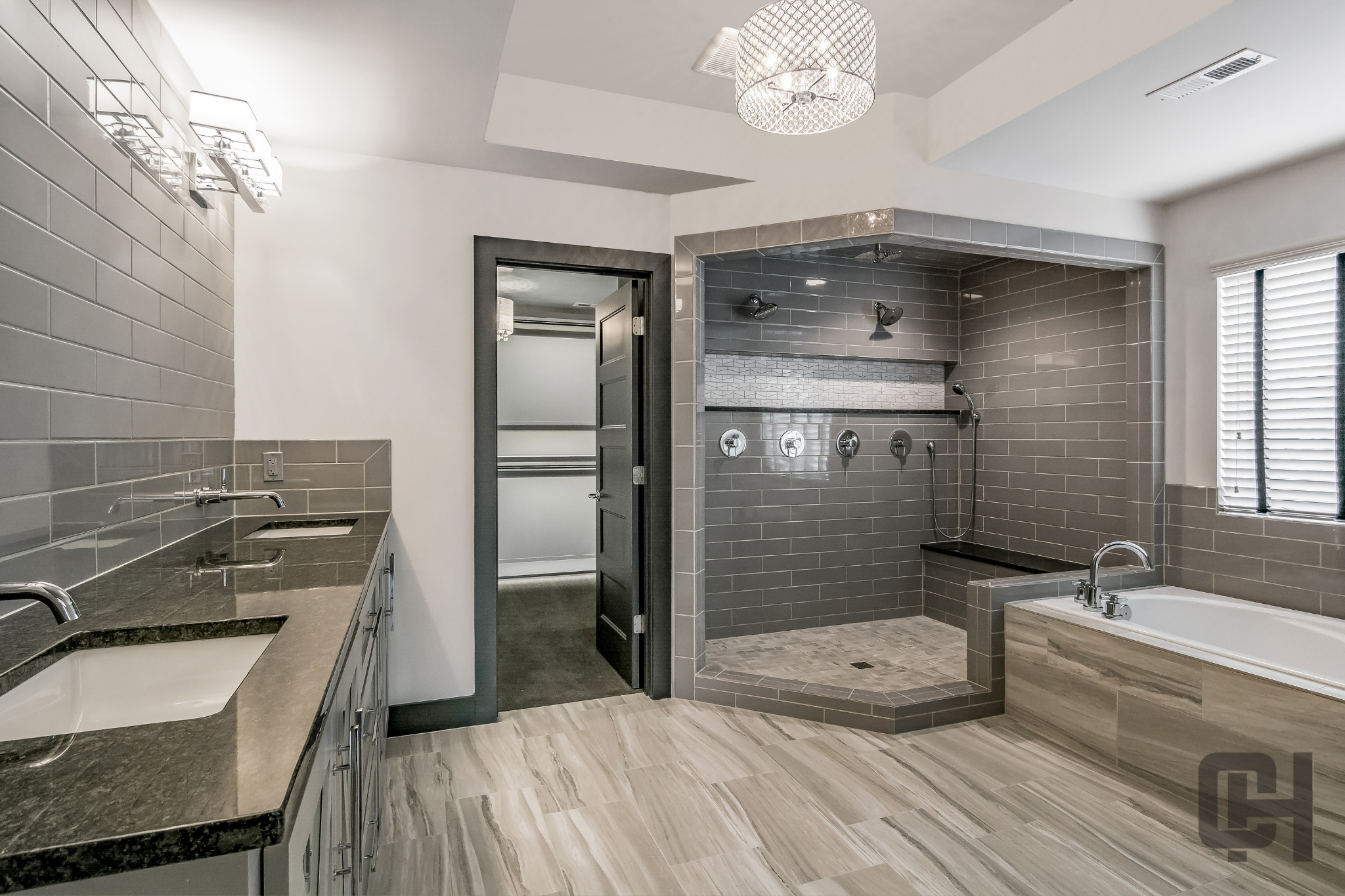 Justina Bathroom With Freestanding Tub And Tile Flooring