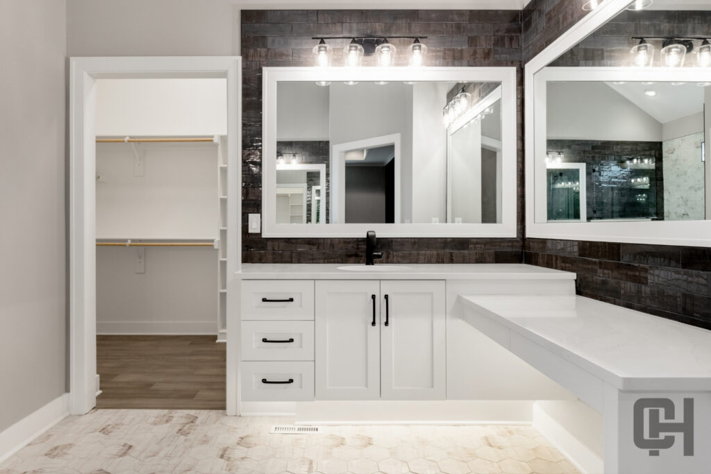 Madalena Bathroom With White Cabinetry And Quartz Countertops