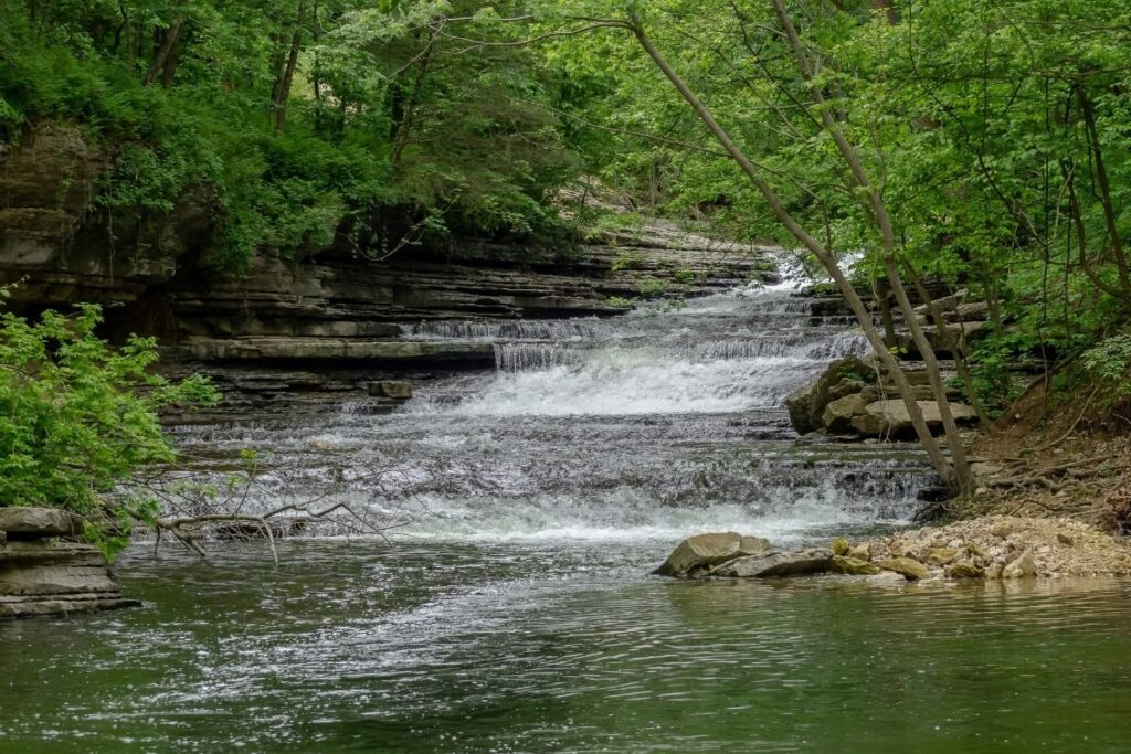 Tanyard Creek Flowing Over Natural Rock Formations In Bella Vista Arkansas