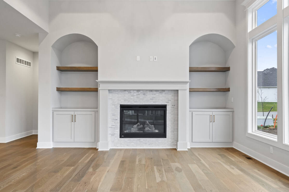 Custom Built In Shelving With Fireplace