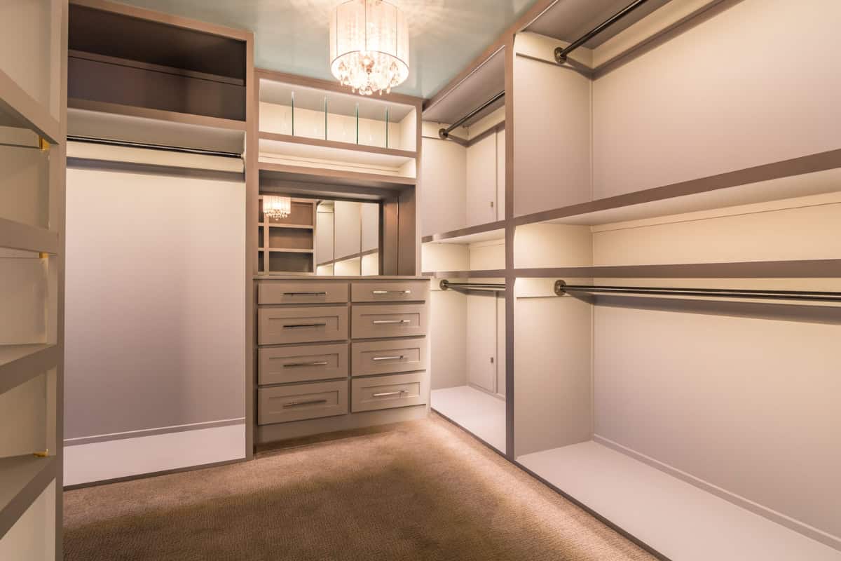Walk-in Custom Closet With Drawers And Hanging Space