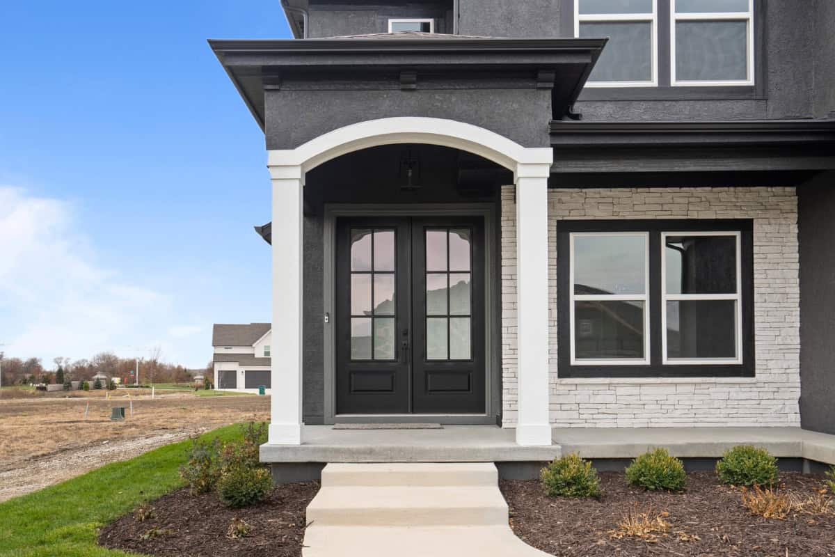 Arched Front Entry With Double Doors