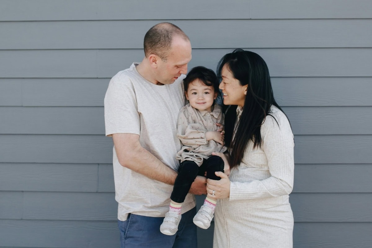 Couple Standing Together In Modern Northwest Arkansas Home