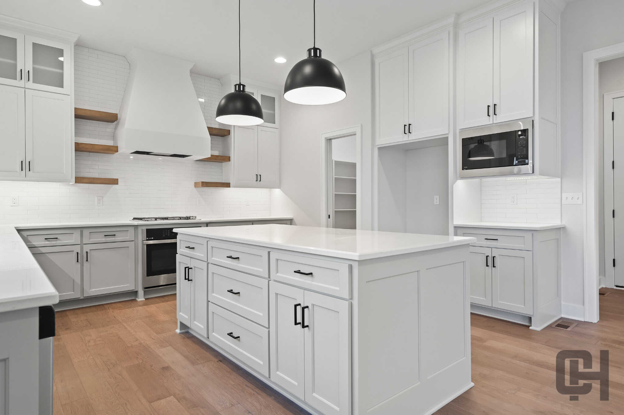 Milano Floor Plan Kitchen With White Cabinets And Island