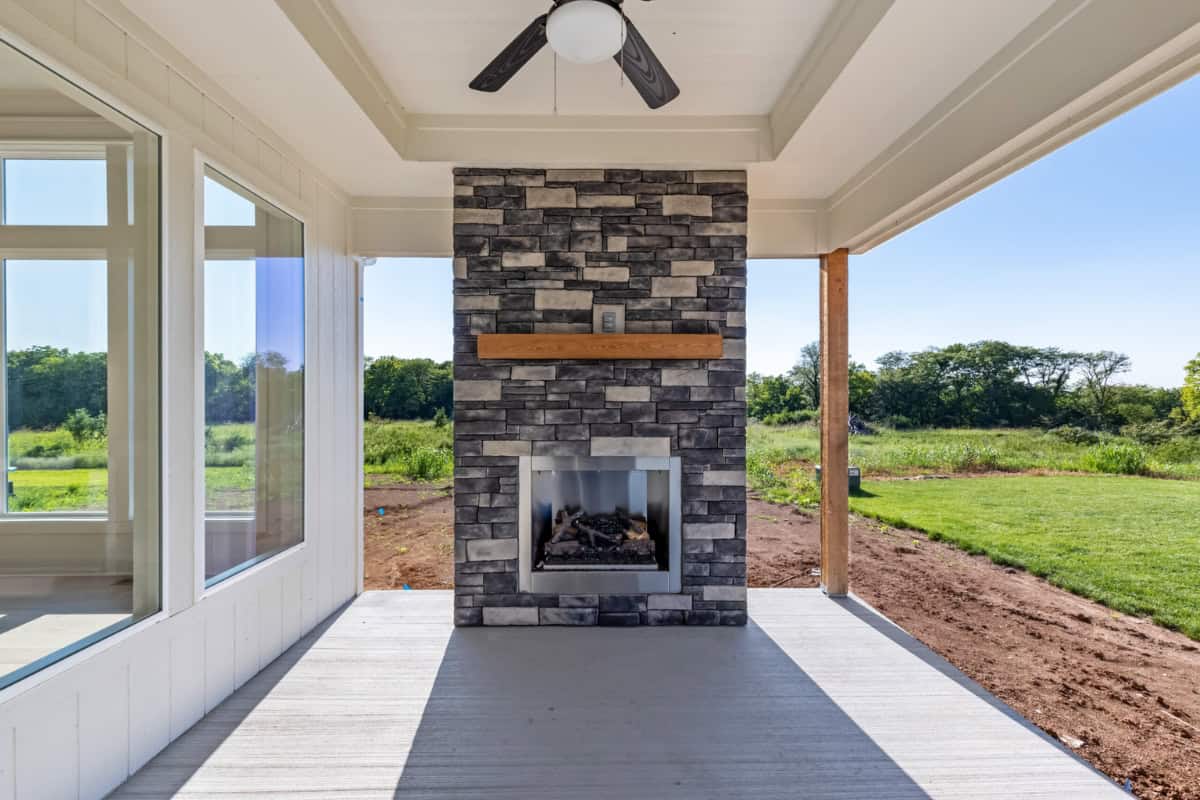 Outdoor Fireplace Overlooking Backyard
