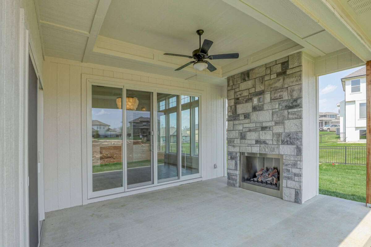 Covered Porch With Outdoor Fireplace