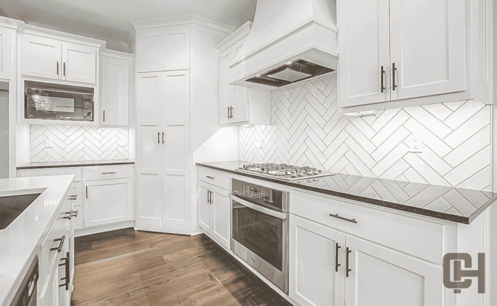 Verona II Kitchen With Tile Backsplash And Stainless Appliances