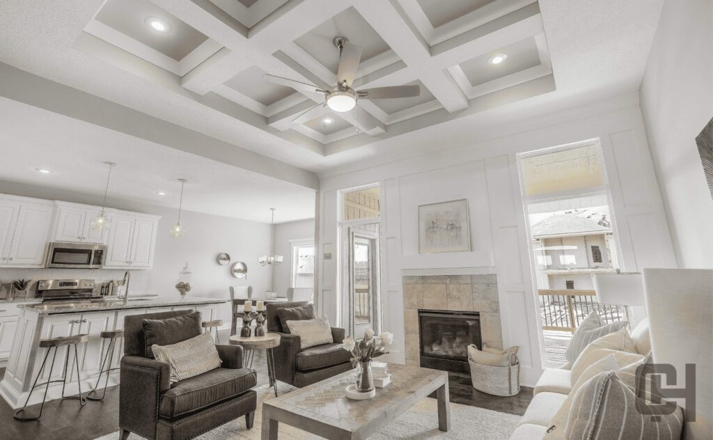 Verona II Living Area With Tray Ceiling And Open Floor Plan