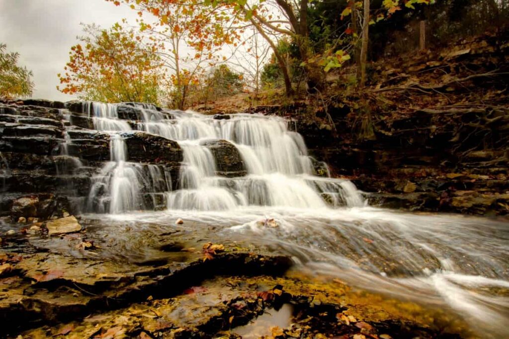 Tanyard Creek Waterfall In Bella Vista Arkansas During Autumn