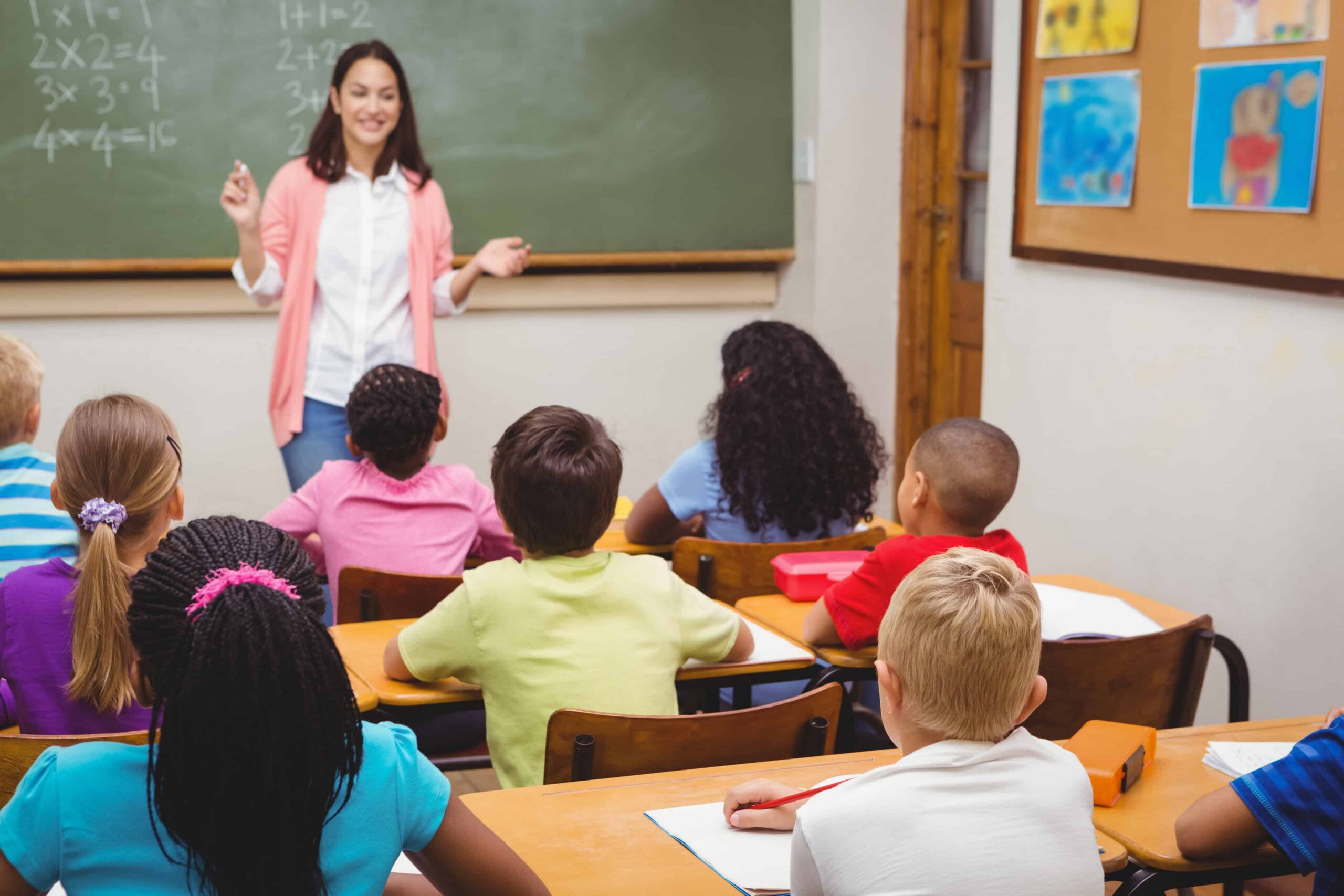 Teacher leading a classroom lesson.